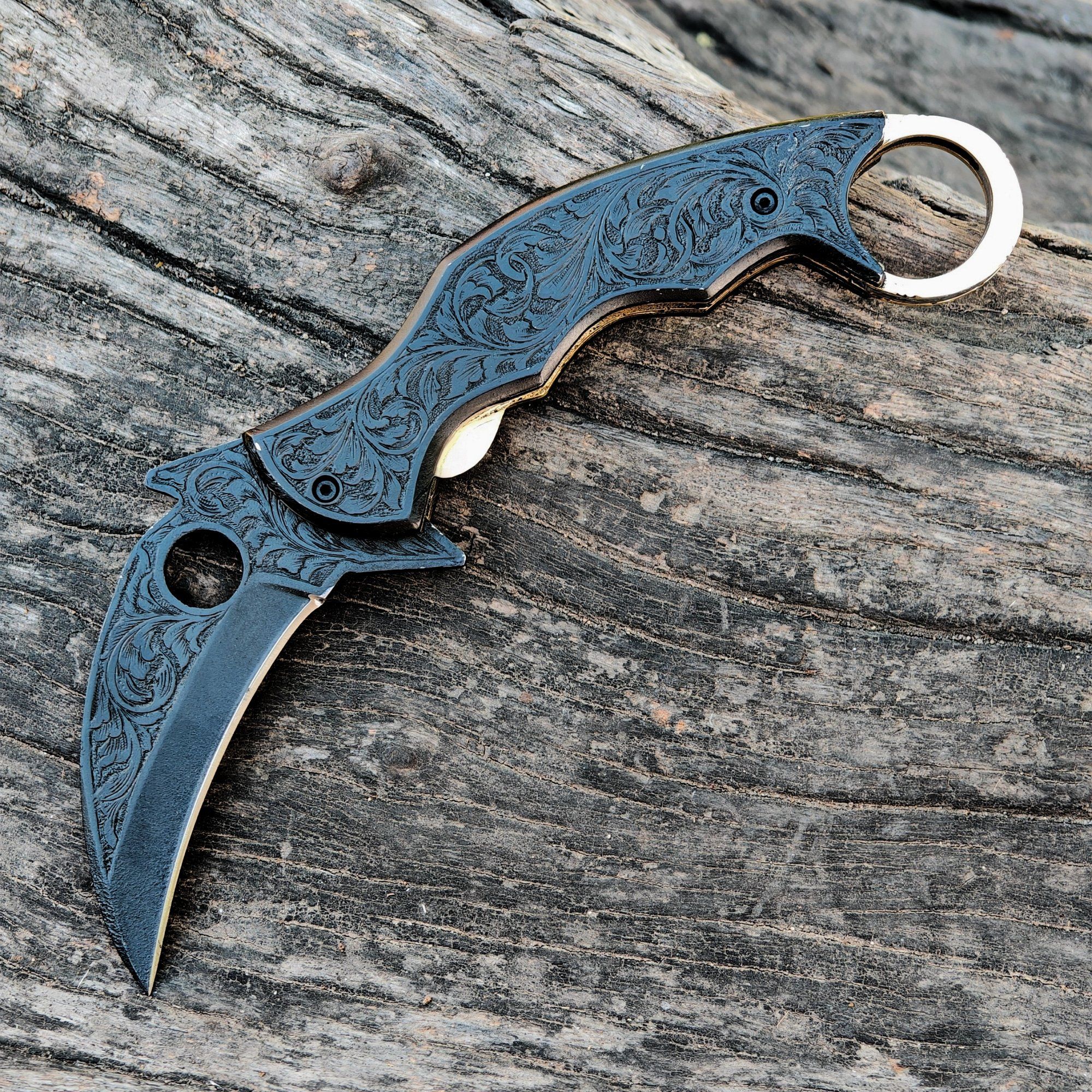 The Engraved Onyx Folding Knife